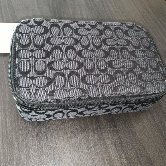 Coach Handbags - BRAND NEW Coach rectangle travel pouch Coach Handbags - BRAND NEW Coach rectangle travel pouch